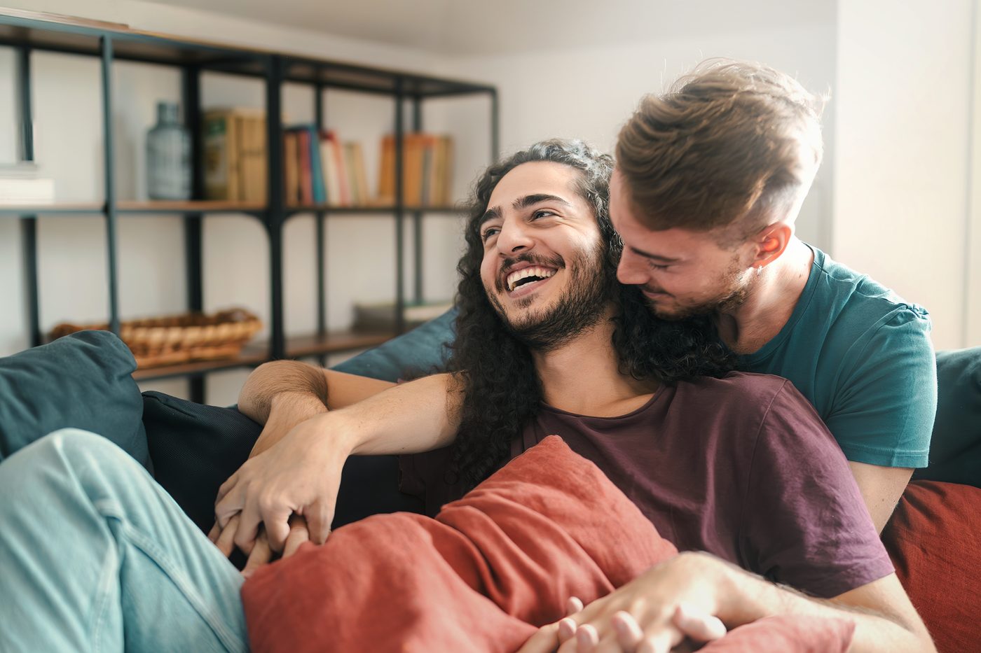 Two Gaydar members laughing together at home